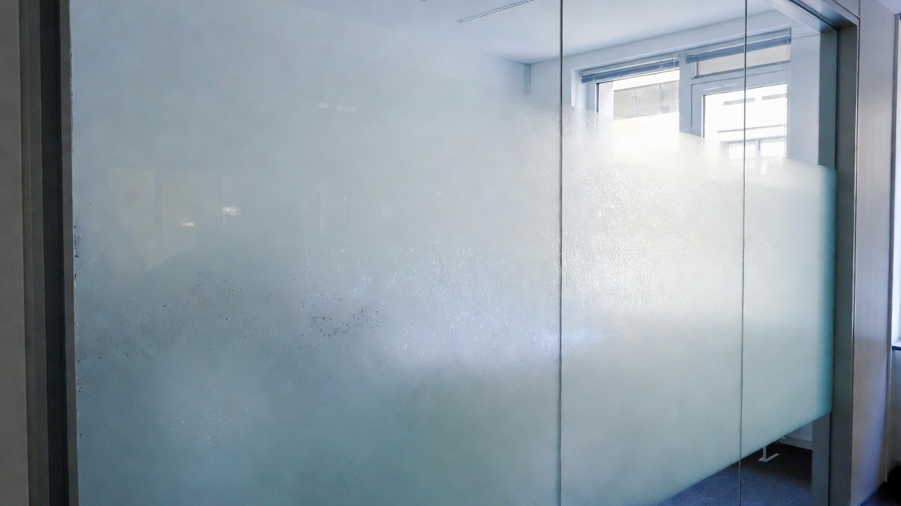 What Are Window Films for Office Privacy in Toronto? Frosted Vinyl, Decorative Film, and Logo Glass Explained